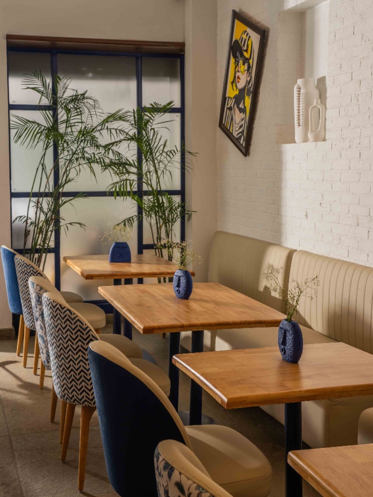 A pop of navy dresses the space