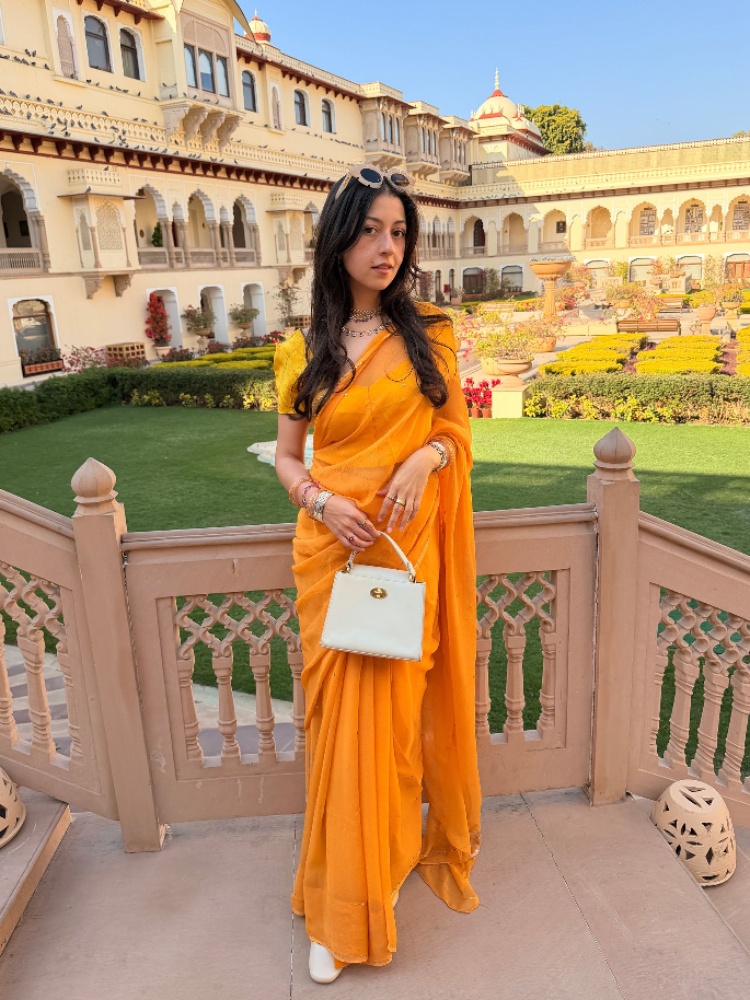 Devisha Kumari Singh in an orange sari