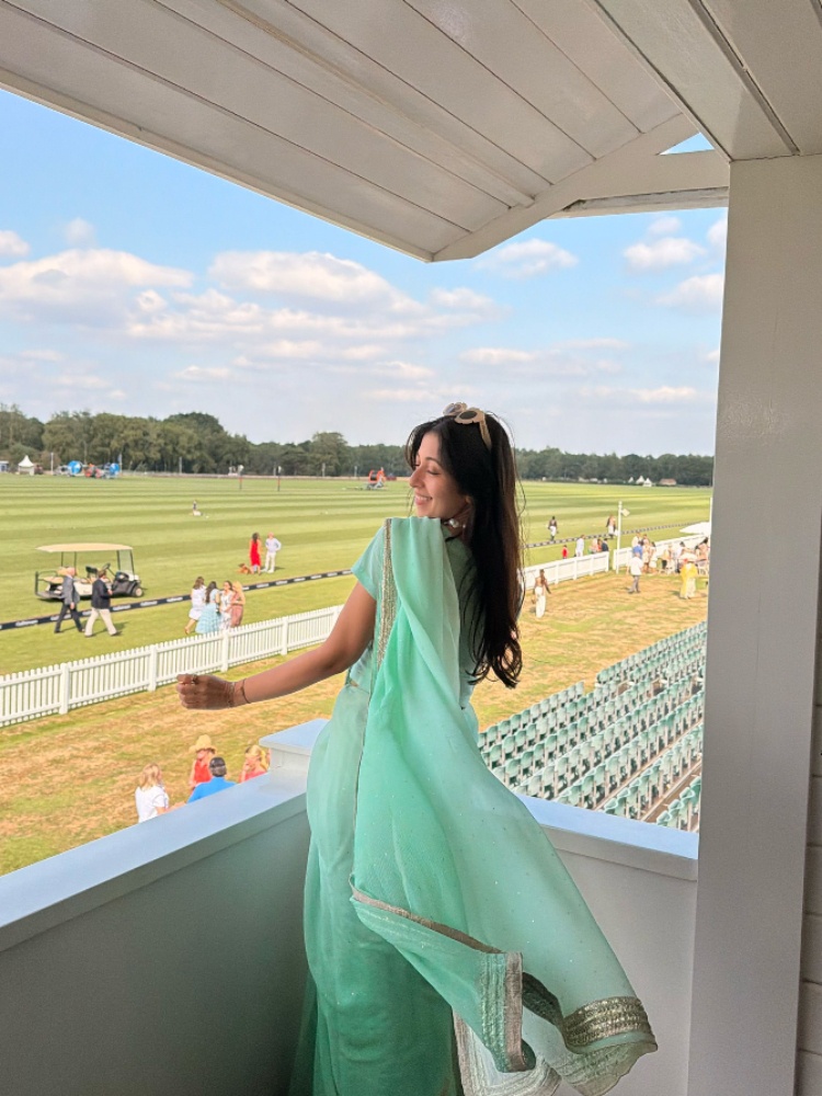 Devisha Kumari Singh attending a polo match in a mint green sari