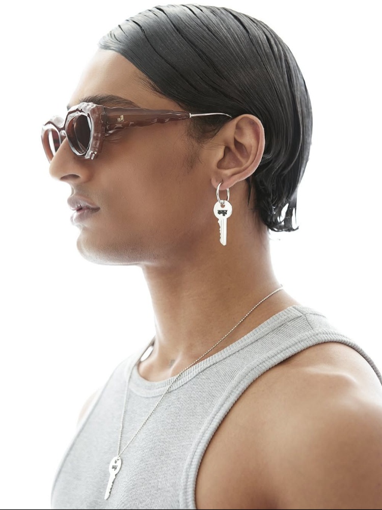 A model wearing Dhruv Kapoor key earrings and necklace from Autumn Winter 2024-25