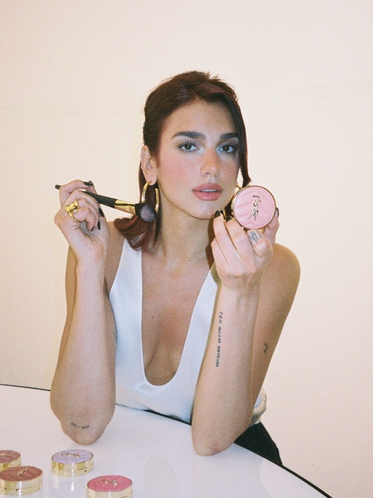 Dua Lipa using YSL Beauty