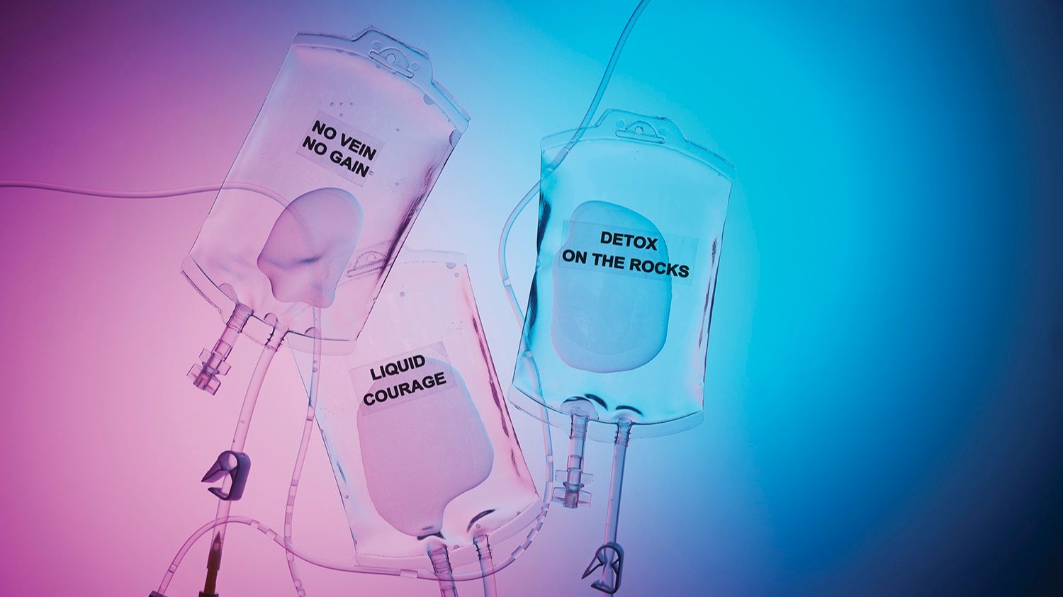 Bags of IV fluid representing wellness drips