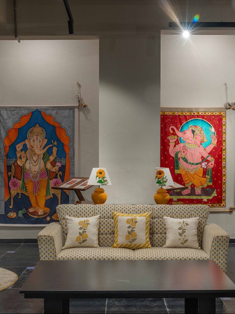 Paintings of deities throughout Gaurang’s store
