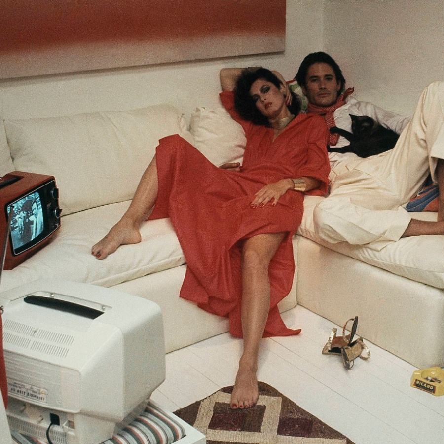 An image of a couple watching TV together