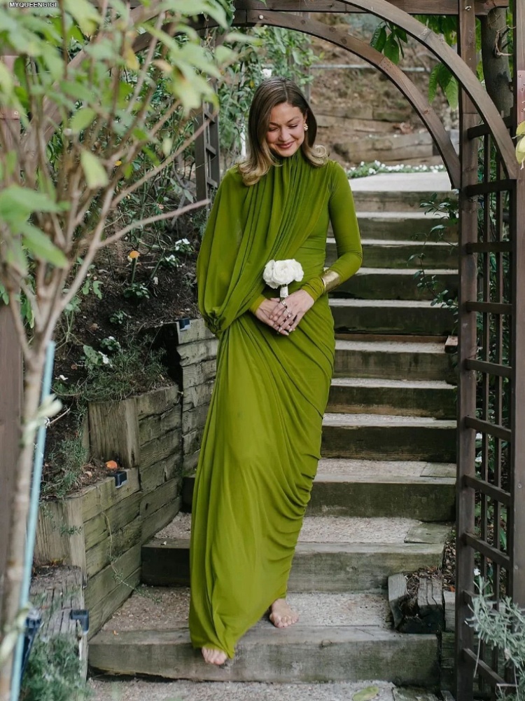 Gigi Hadid attends a wedding in the Suzie gown by homegrown Indian brand Deme by Gabriella