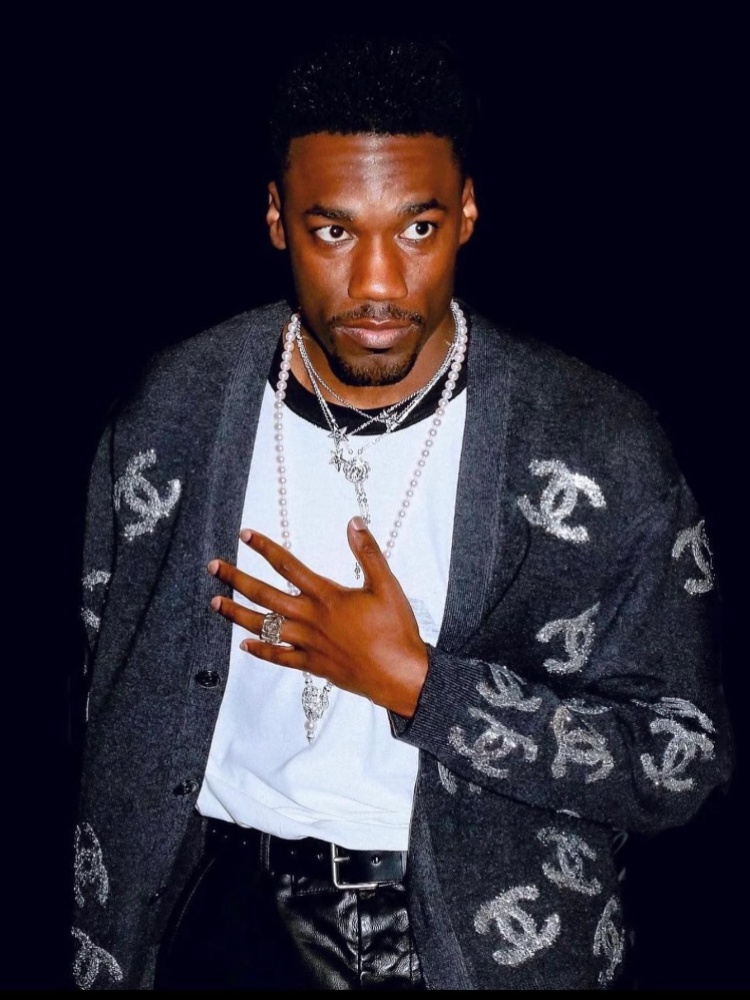 Giveon in a Chanel cardigan