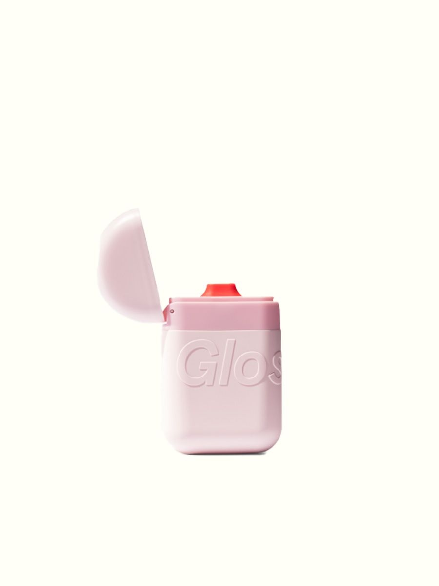 Glossier hand cream in the Nod's summer travel essentials guide