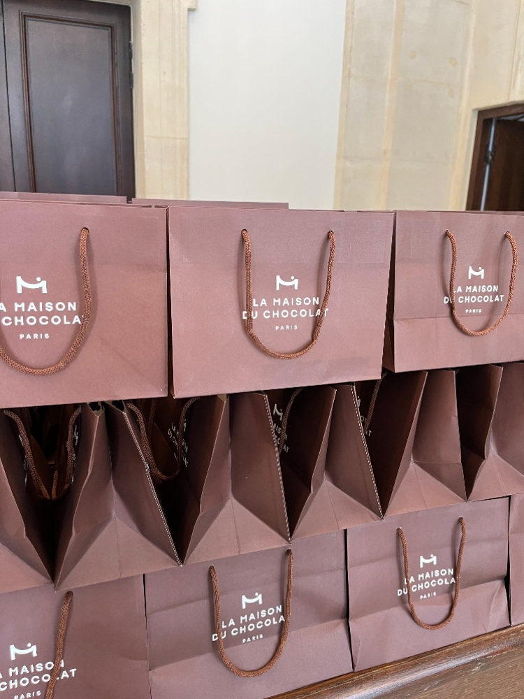 Goodie bags filled with chocolate at Lyas’s La Watch Party in Paris during fashion week