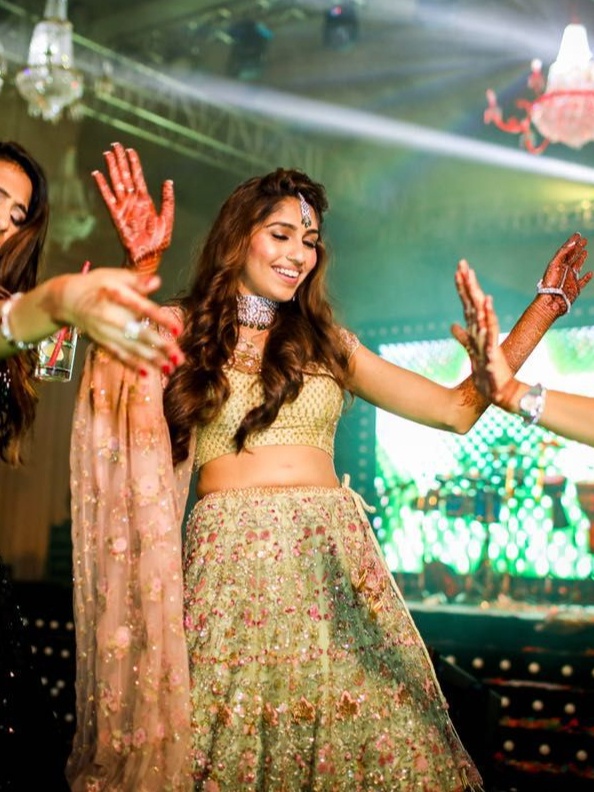 Isha Sutaria in a Shyamal & Bhumika sage green lehenga at her sangeet