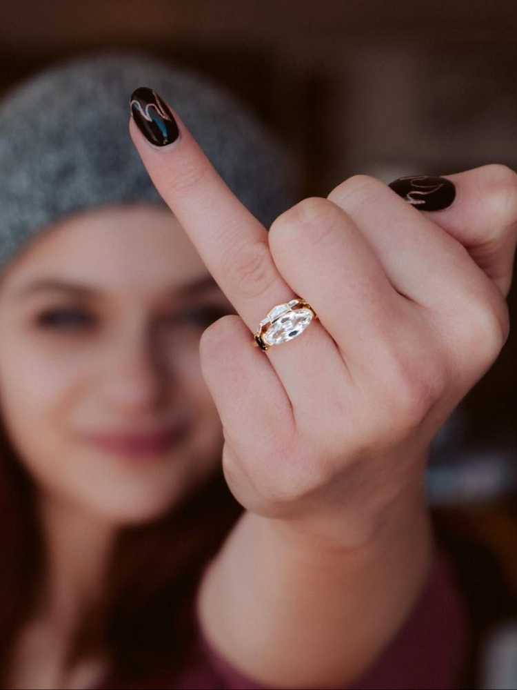 Joey King's elongated oval cut east-west engagement ring from Mociun
