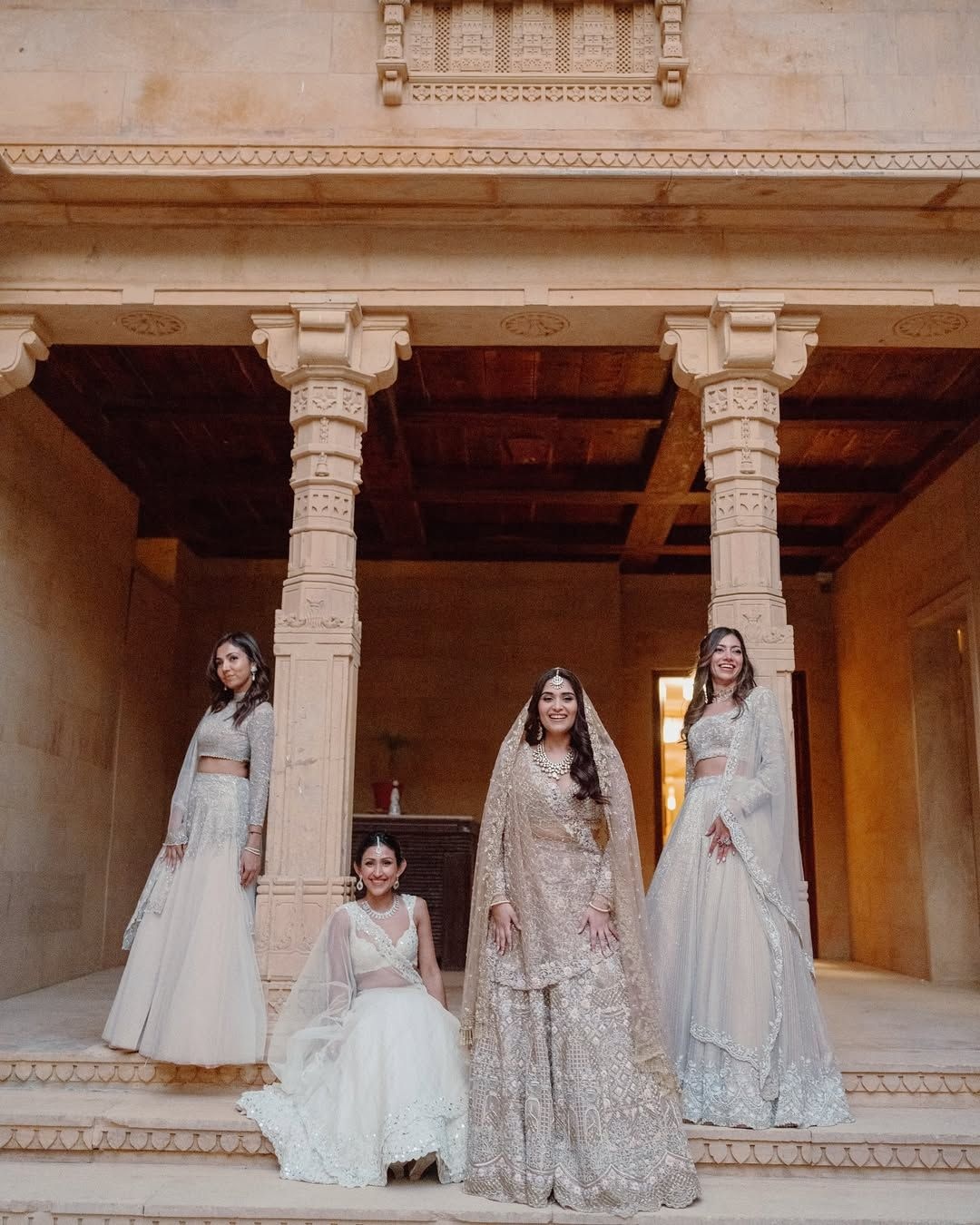 Bride Karyna Bajaj with her bridesmaids in Suryagarh, all in custom Kresha Bajaj lehengas