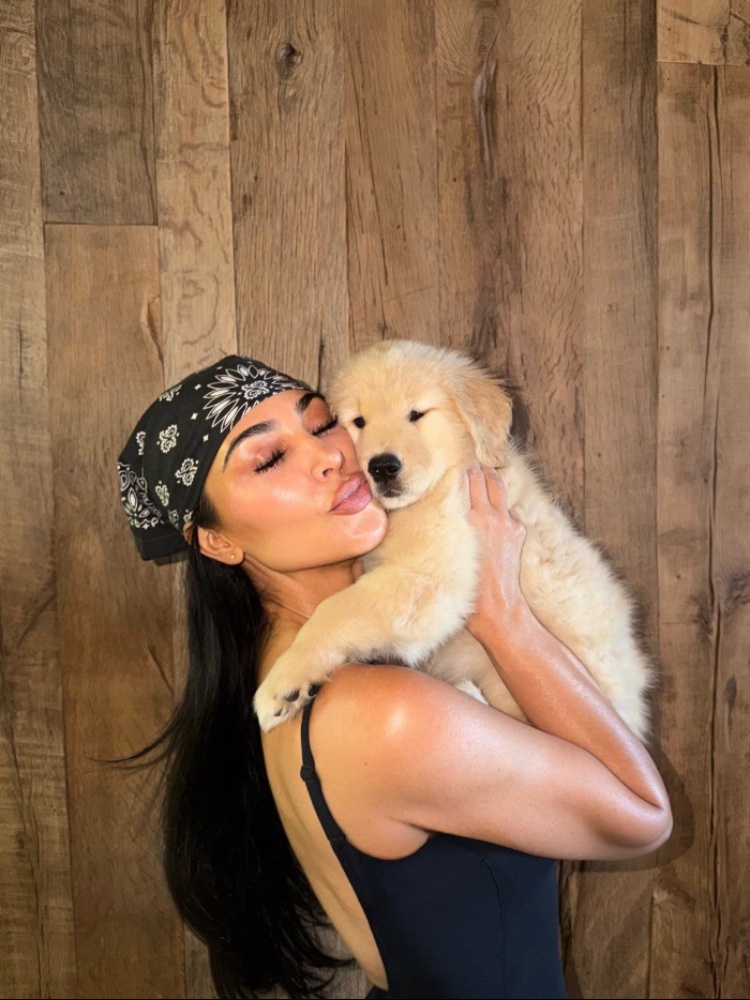 Kim Kardashian wearing a black and white bandana