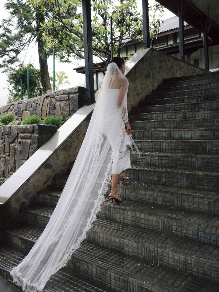 A model wearing a bridal mekhela from Kintem's Bonded bridal collection
