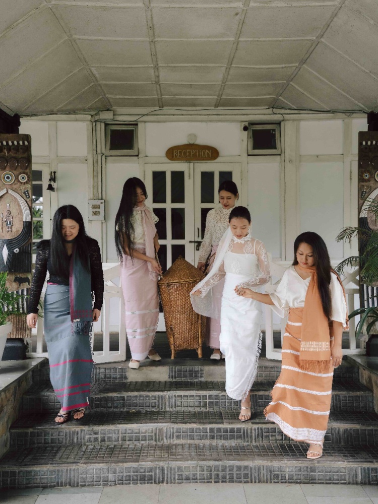 An image from Kintem's Bonded campaign showcasing a bride and her bridesmaids in contemporary Naga mekhelas
