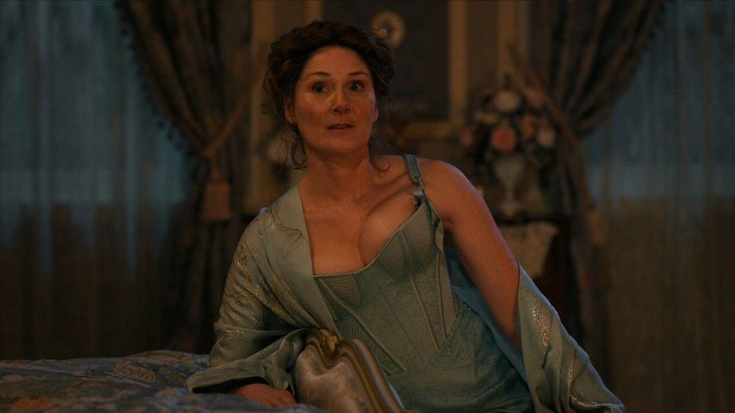 Lady Violet Bridgerton (Ruth Gemmell) in a matching corset, knickers, and robe in Season 4 of the Netflix show
