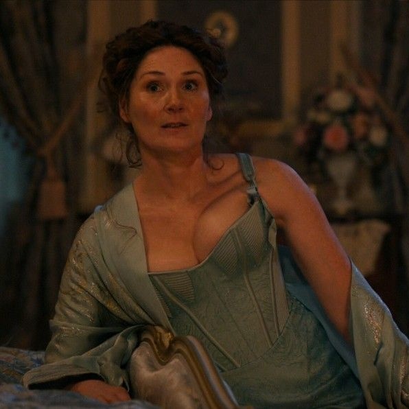 Lady Violet Bridgerton (Ruth Gemmell) in a matching corset, knickers, and robe in Season 4 of the Netflix show