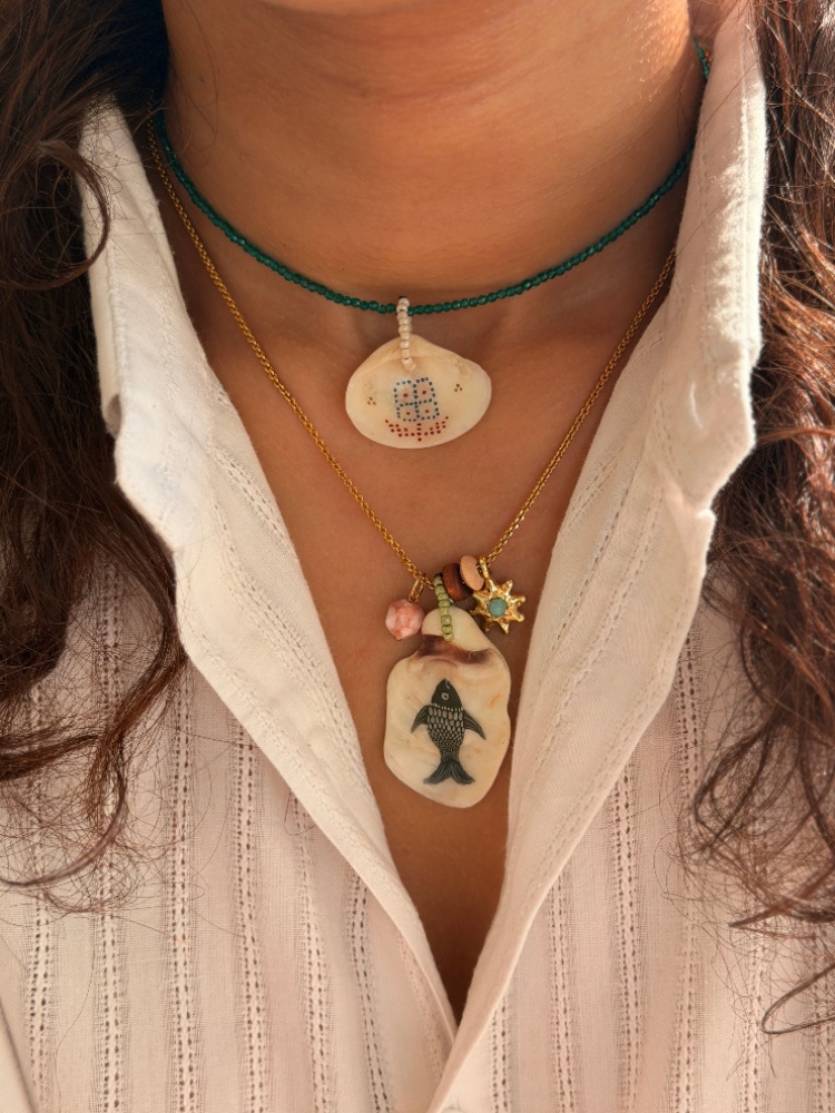 Painted shell pendants form Mana Studio, a Surat-based jewellery designer