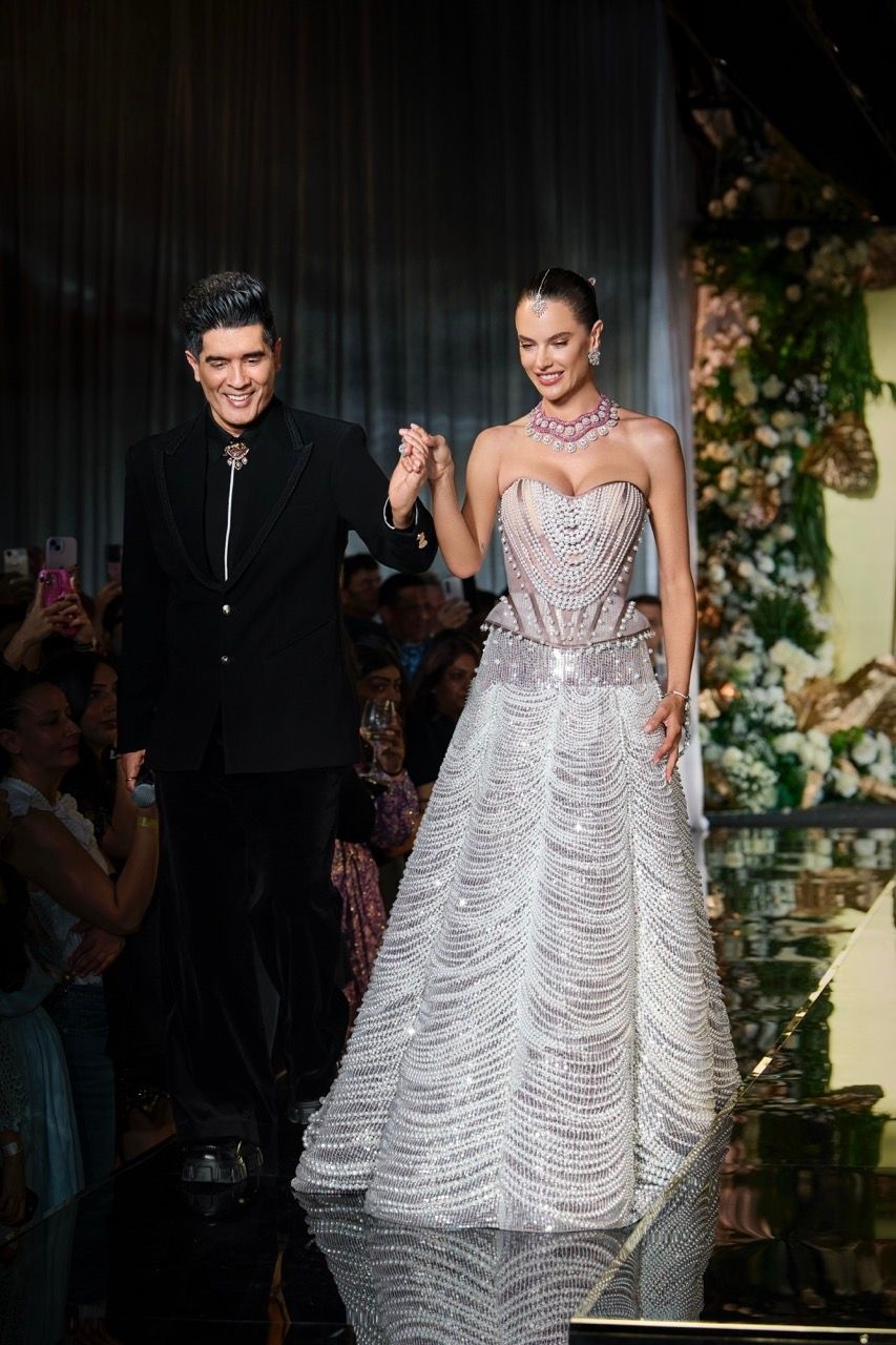 Manish Malhotra with model Alessandra Ambrosio at India Couture Week 2025
