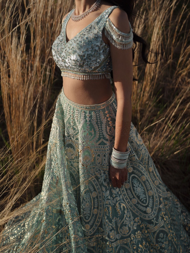 The bride chose a Falguni Shane Peacock lehenga for the sangeet