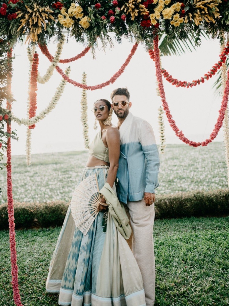 Model Nidhi Sunil and musician Noah Katz-Appel at their mehendi ceremony in ReCeremonial by Ateev Anand