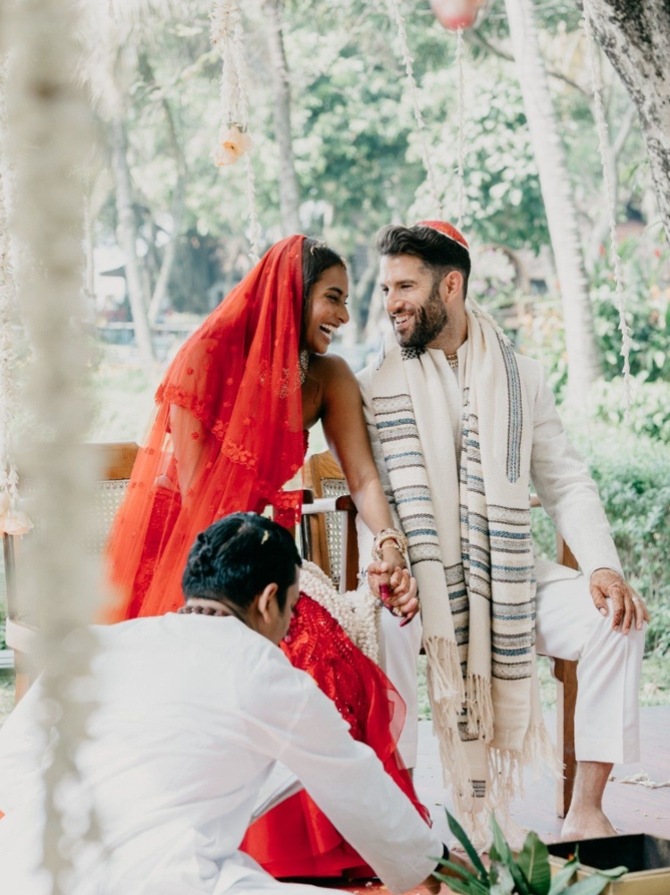 The groom Noah Katz-Appel wore a tallit, a Jewish prayer shawl, and a kippot
