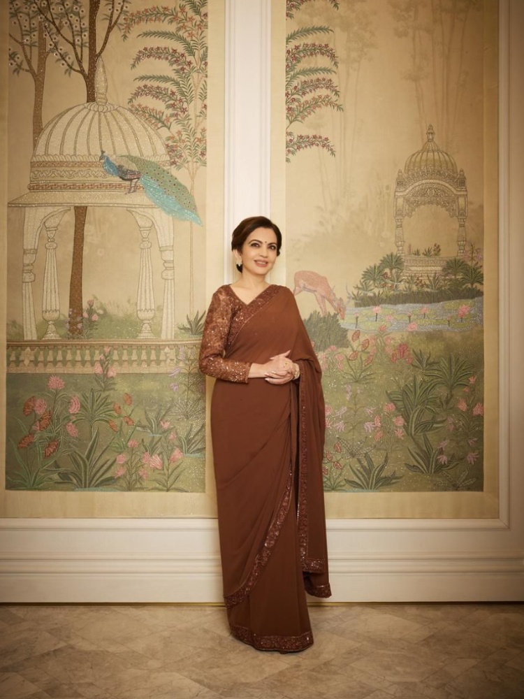 Nita Mukesh Ambani in a mocha sari by Manish Malhotra