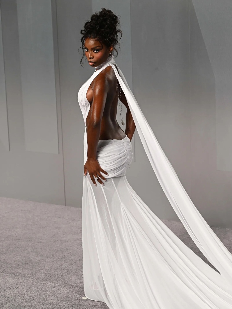 Olandria at the Vanity Fair Oscar Party in a white dress