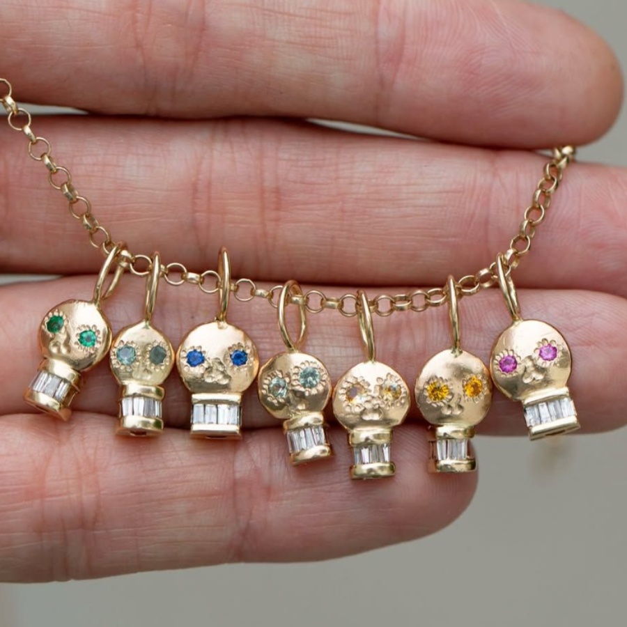 Skull pendants by Oxbow Designs with diamond baguette teeth