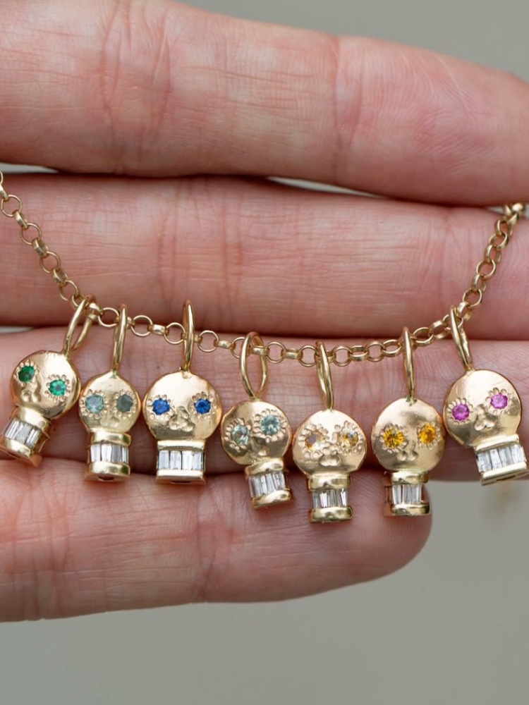 Skull pendants by Oxbow Designs with diamond baguette teeth