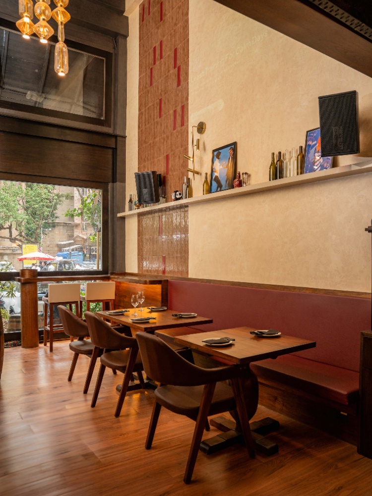 Pique’s long, narrow, warmly lit, double-height room