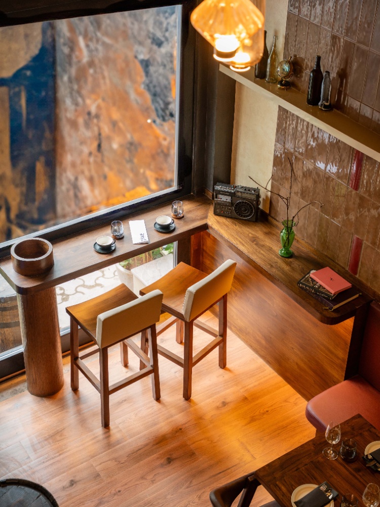 Earthy wooden interiors are seen at Pique
