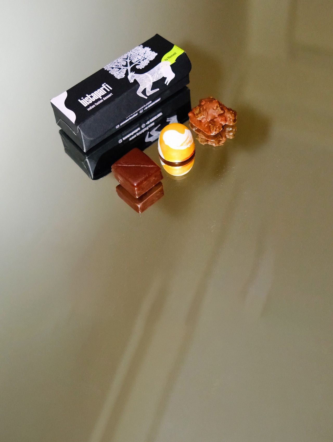 Kajukatli raspberry cube, Mysore Pak coffee bonbon, Pistabarfi rocher