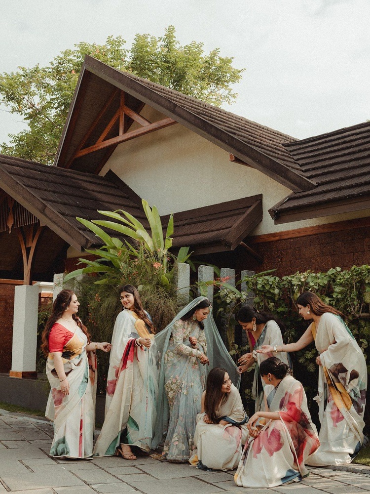 Priya Mittal with her bridesmaids, who all wore Yam saris