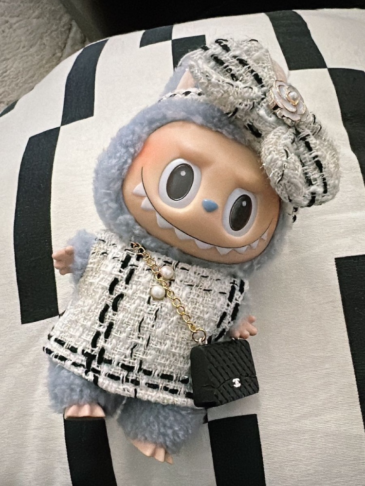 Sea Salt Coconut Labubu dressed in a 'Chanel' outfit