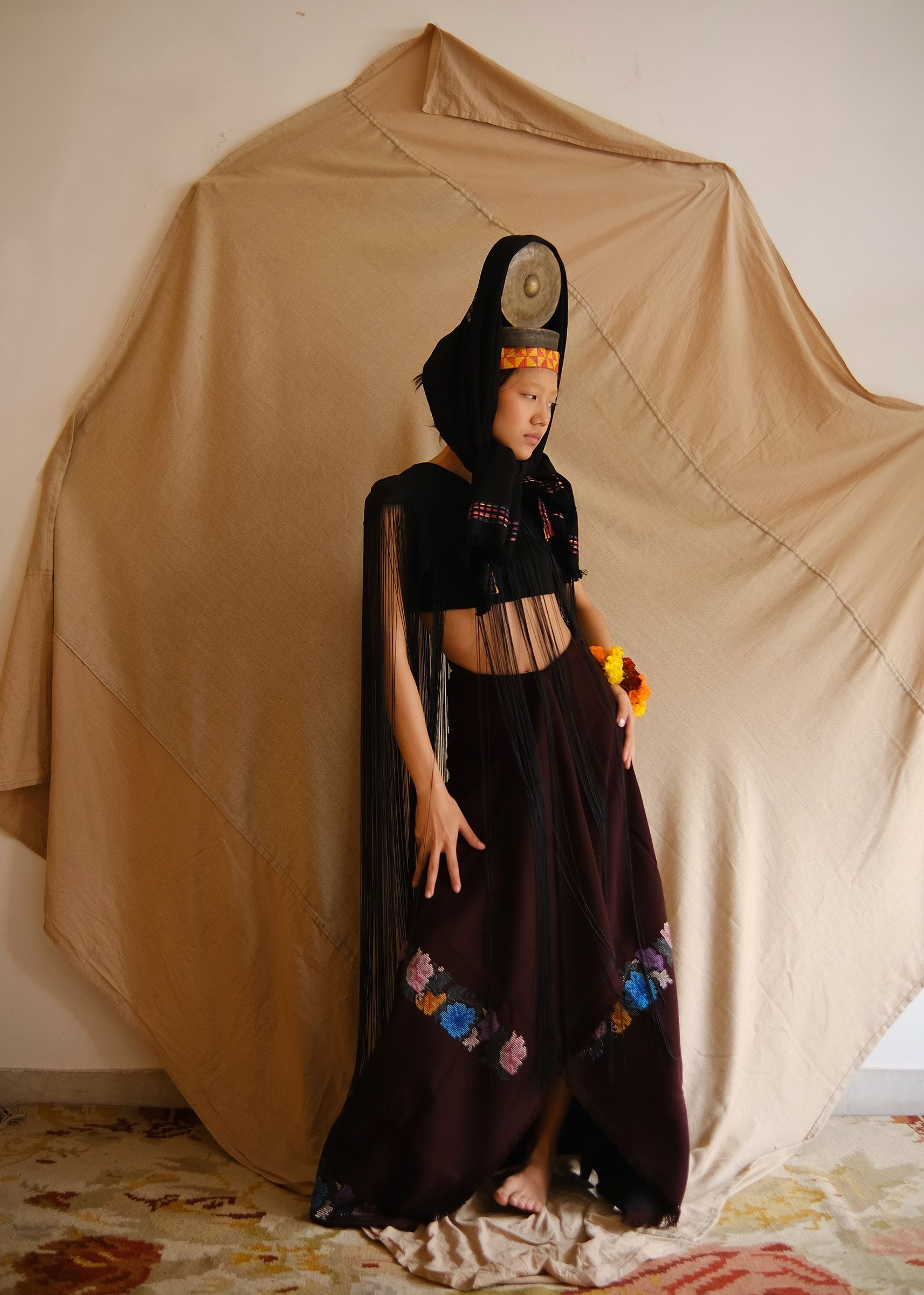 Maria Guite in a Zo Weave scarf and traditional puan and a top by Bygone Echoes