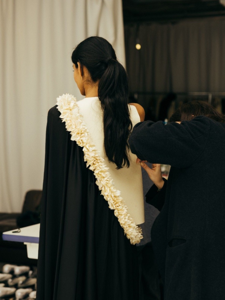 A modern sari dress featuring mogras from Raw Mango's London Fashion Week collection being fitted on a model