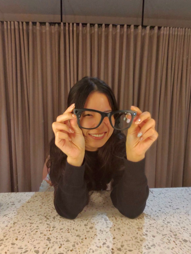 Chloe Chou, fashion writer at The Nod, with the Ray Ban Meta smartglasses