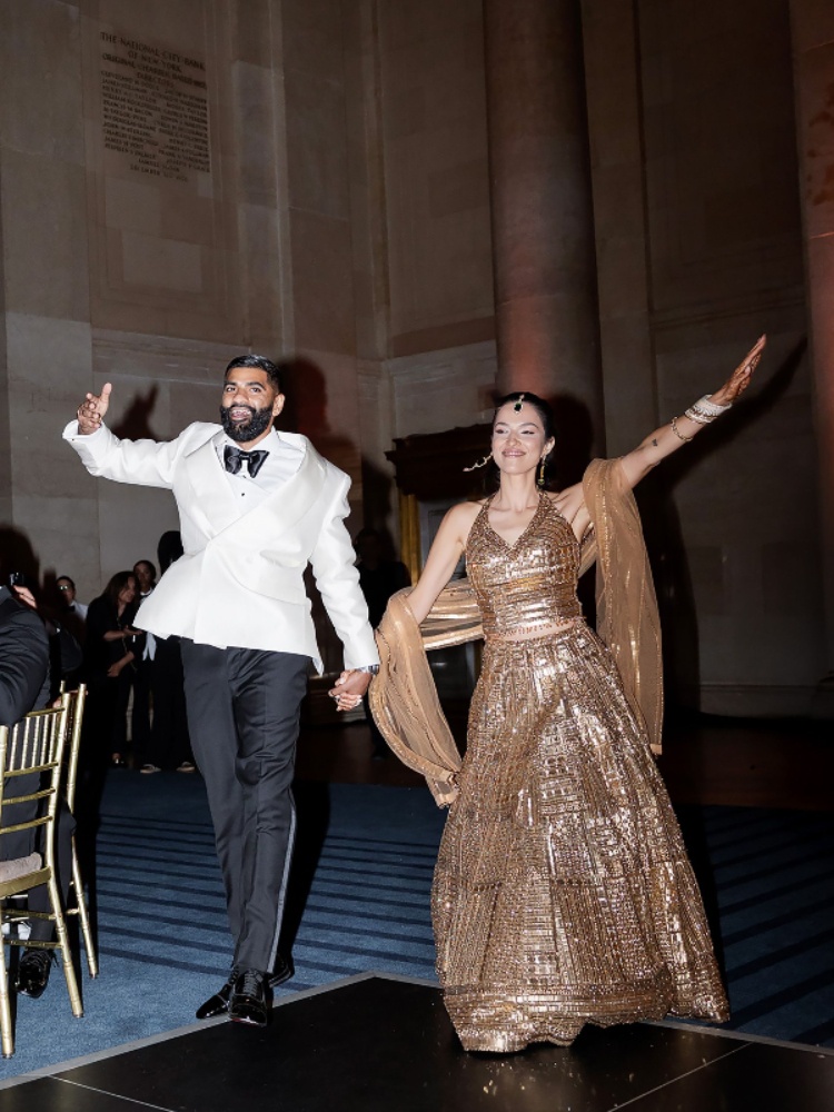Shobhita wore a lehenga by Seema Gujral and Kavaneet wore a custom tuxedo