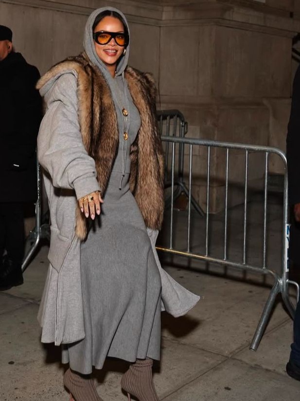 Rihanna in grey hoodie and matching flared skirt from Patou AW24 in New York