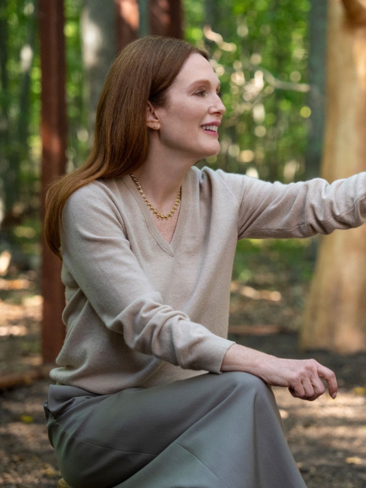 Julianne Moore caressing a bird in Sirens, the show on Netflix