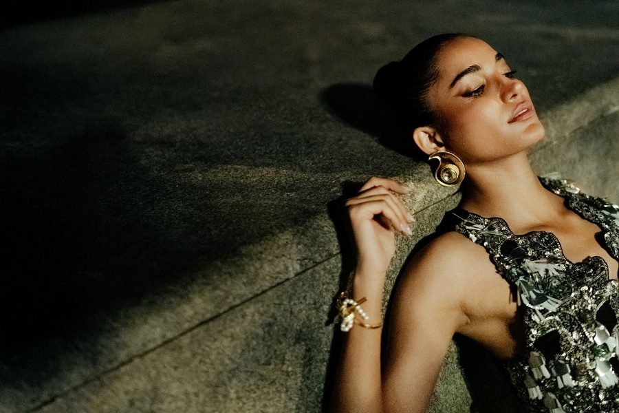 A model wearing a black embellished blouse from Graine and sari from EKAYA X 431-88