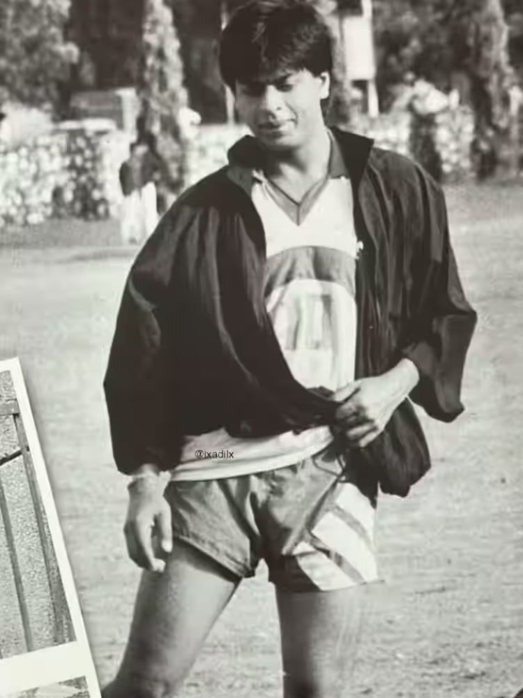 Bollywood star Shah Rukh Khan in Adidas shorts playing football