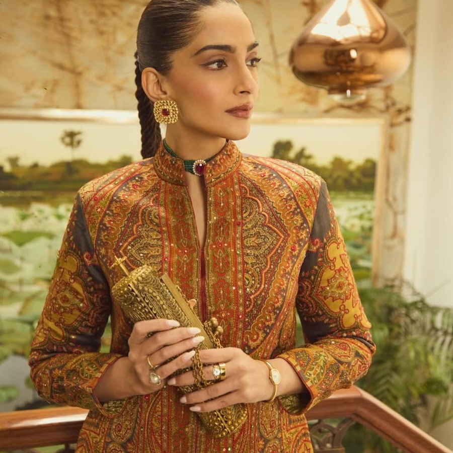 Bollywood actor Sonam Kapoor carrying a Meera Mahadevia clutch bag