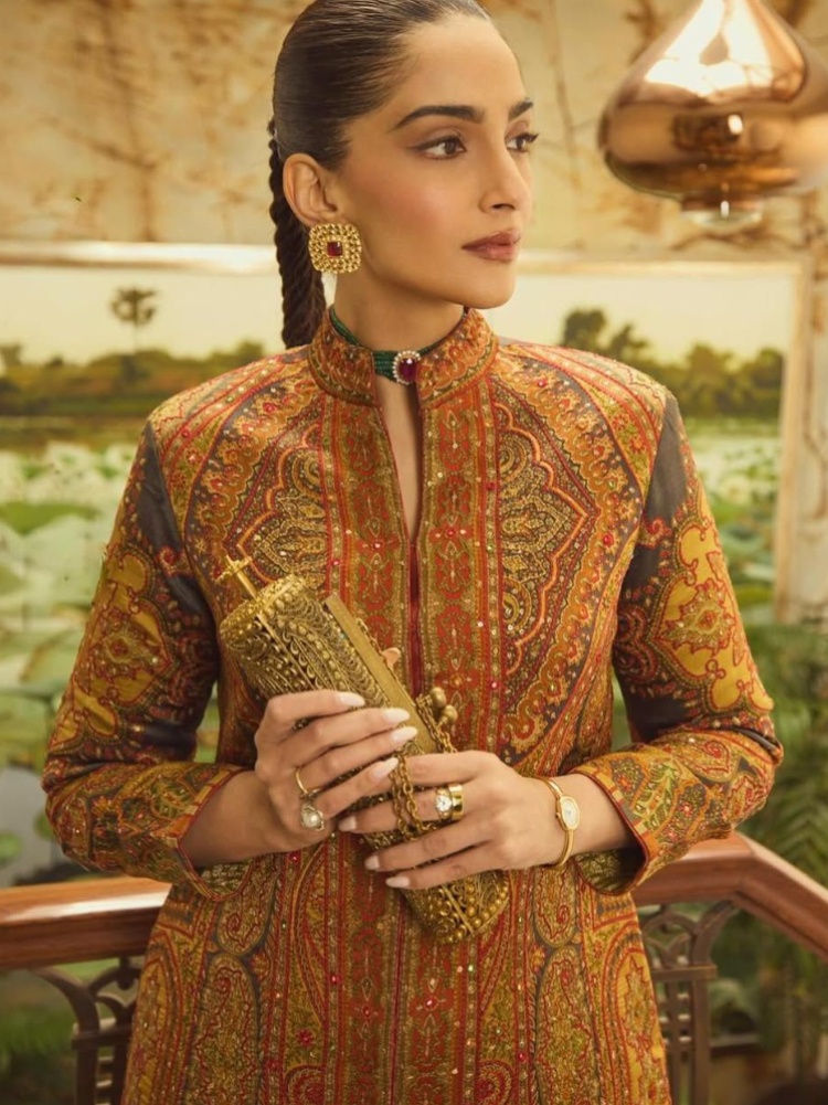 Bollywood actor Sonam Kapoor carrying a Meera Mahadevia clutch bag