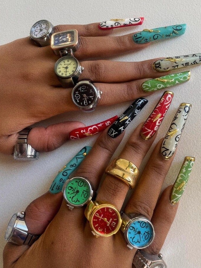 Megan Thee Stallion shows off her collection of watch rings on Instagram