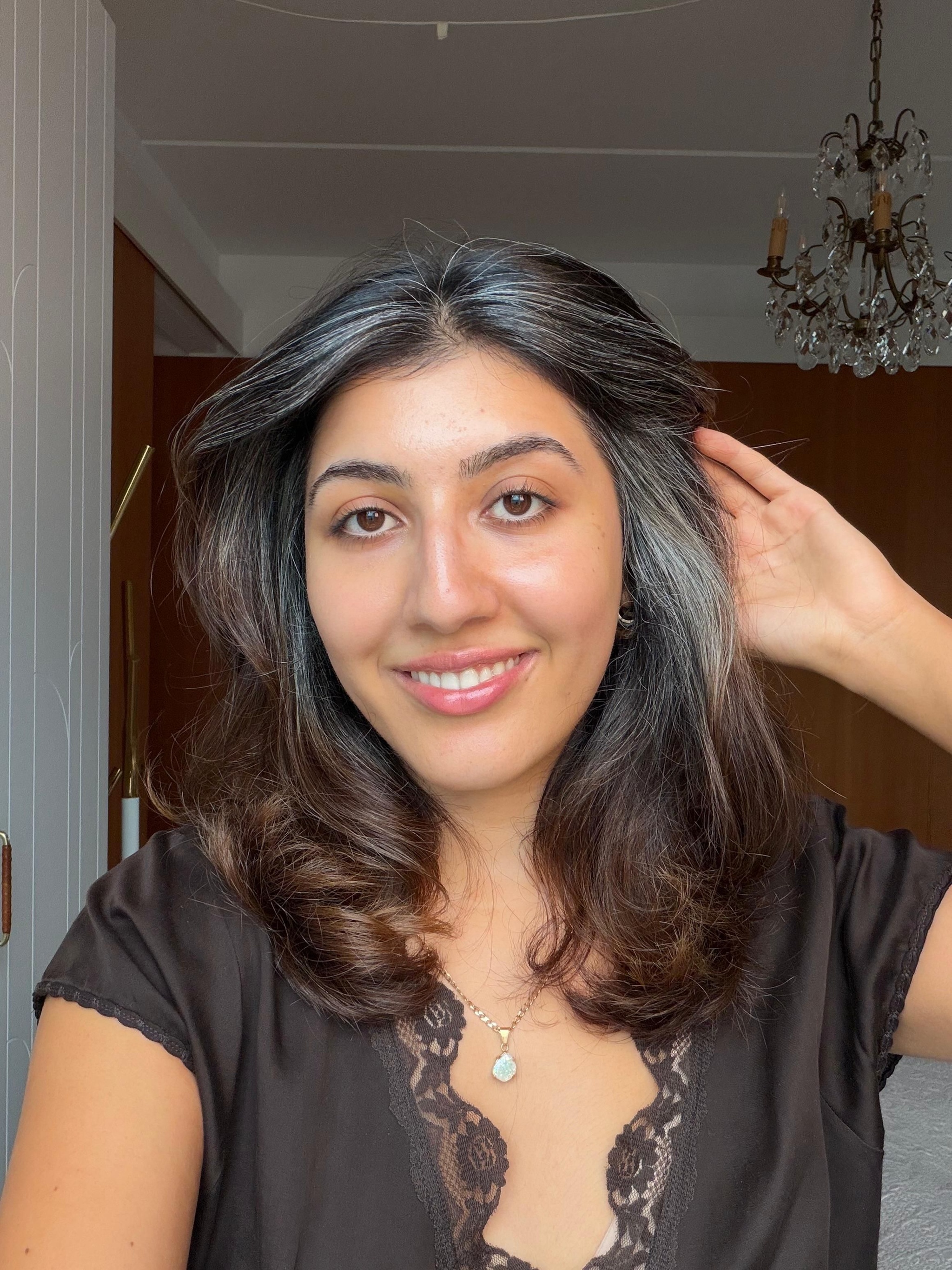 Darya, 28, embraced her greys after scalp had a painful allergic reaction to a dye job