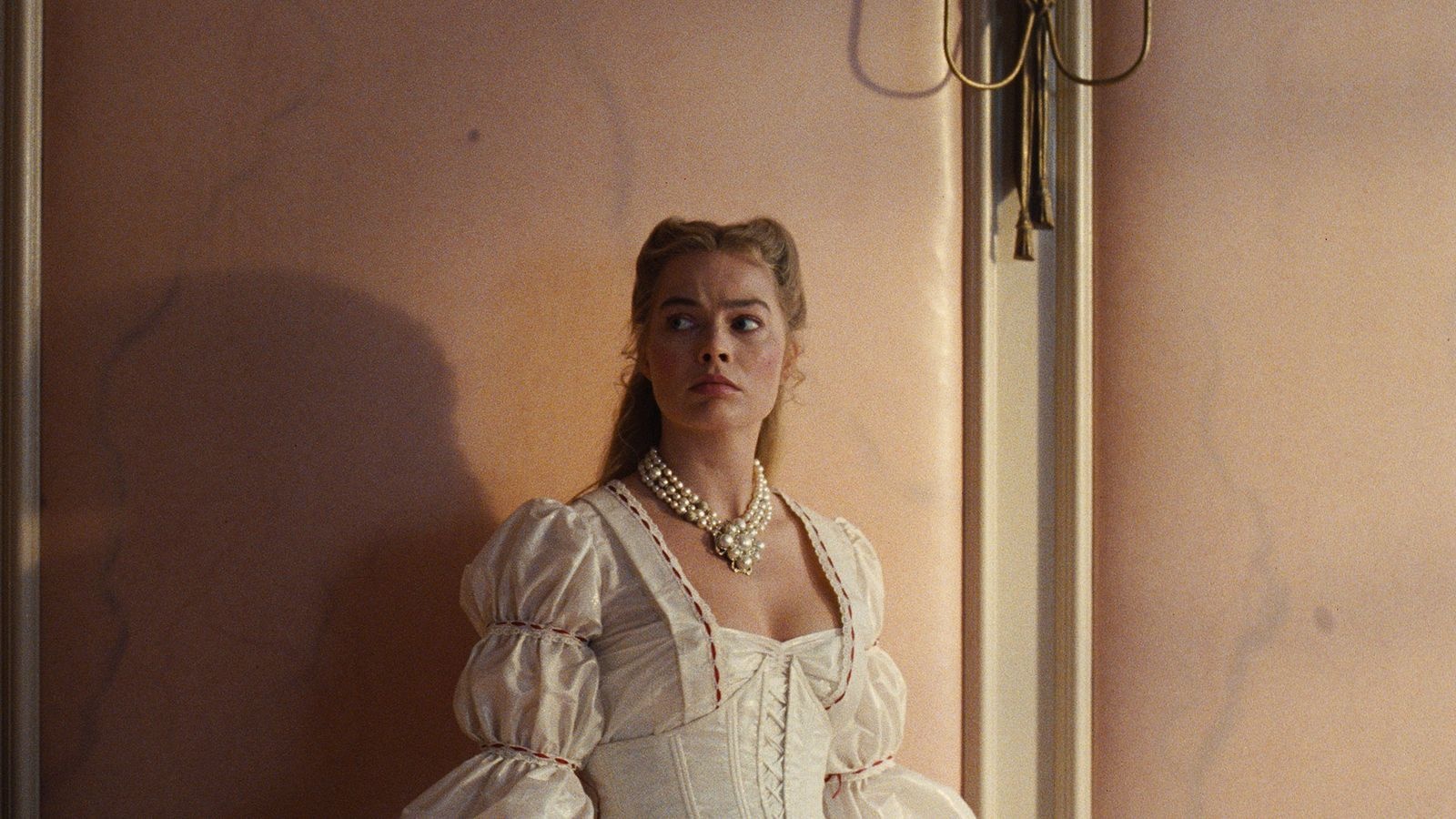 Margot Robbie as Catherine Earnshaw in Emerald Fennell's "Wuthering Heights" in the skin room