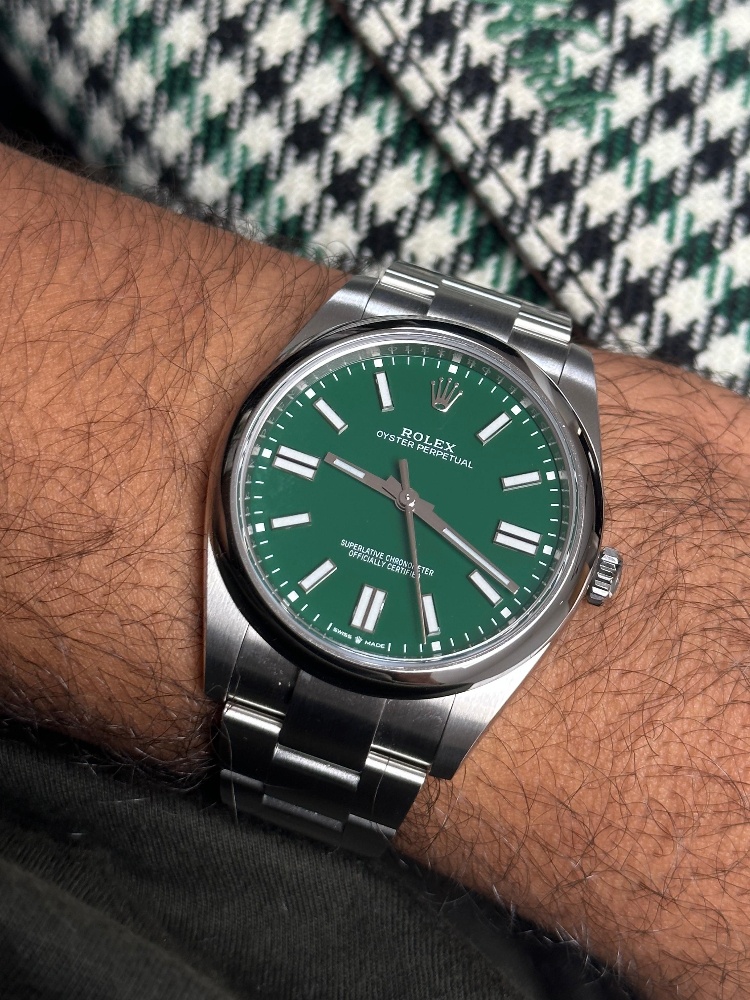 Rolex Oyster Perpetual green dial watch