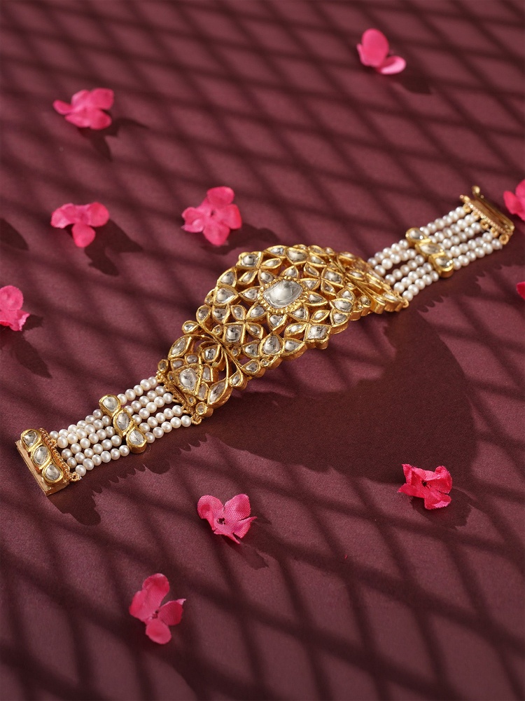 22KT gold bracelet with uncut diamonds and pearls