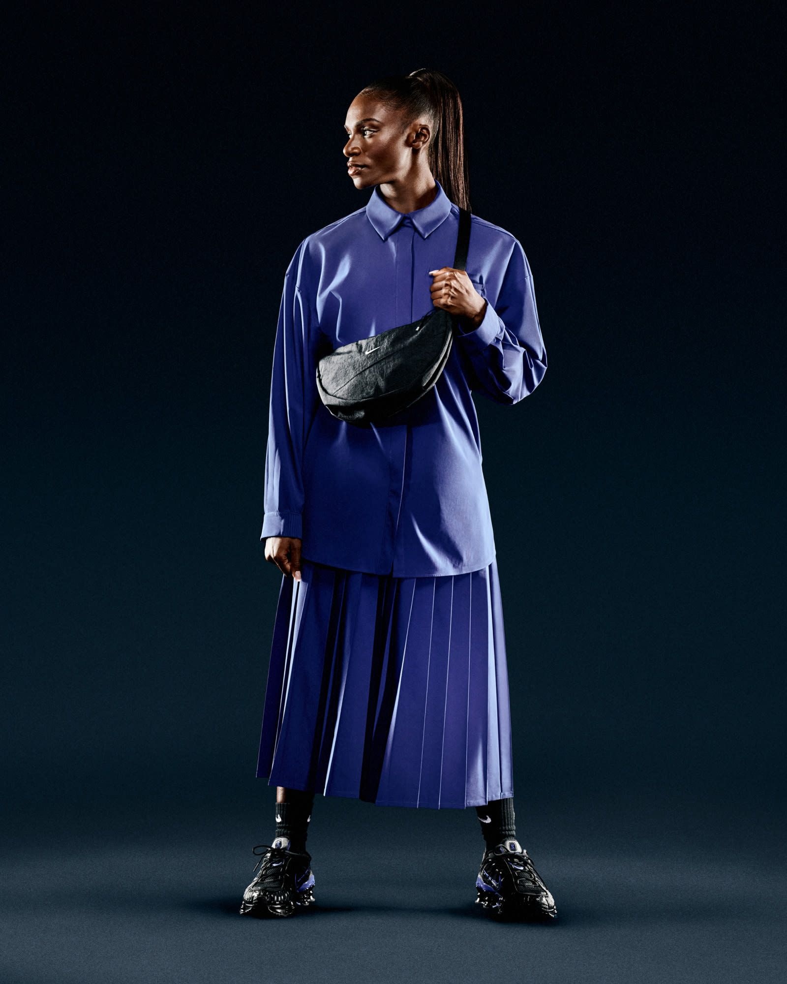 Nike's new 24.7 collection includes oversized shirts and a pleated skirt in high performance fabrics